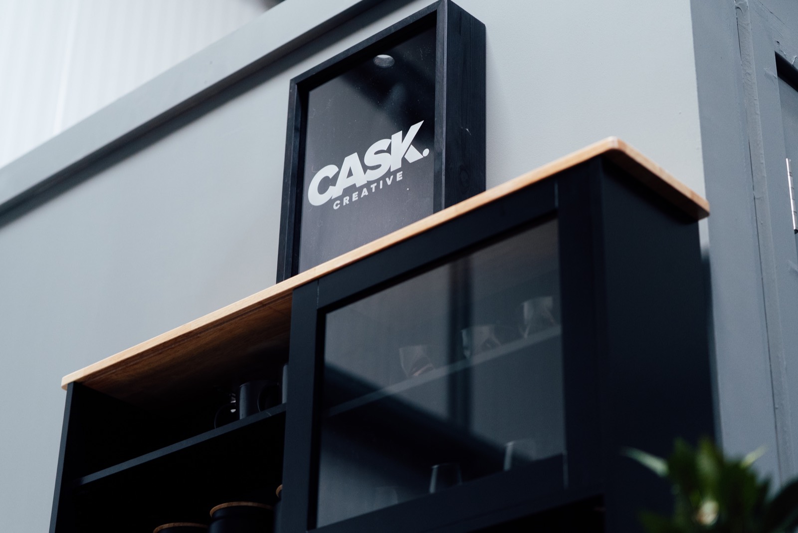 CASK Creative sign on the studio cabinet